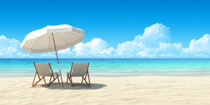 Beach chair and umbrella on sand beach. Concept for rest, relaxa