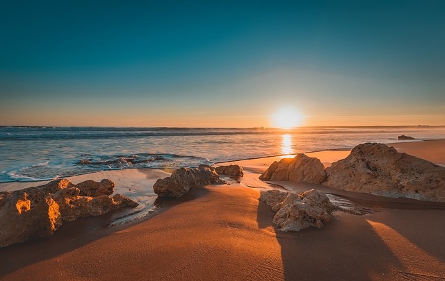 Vakantie Portugal zonsondergang strand